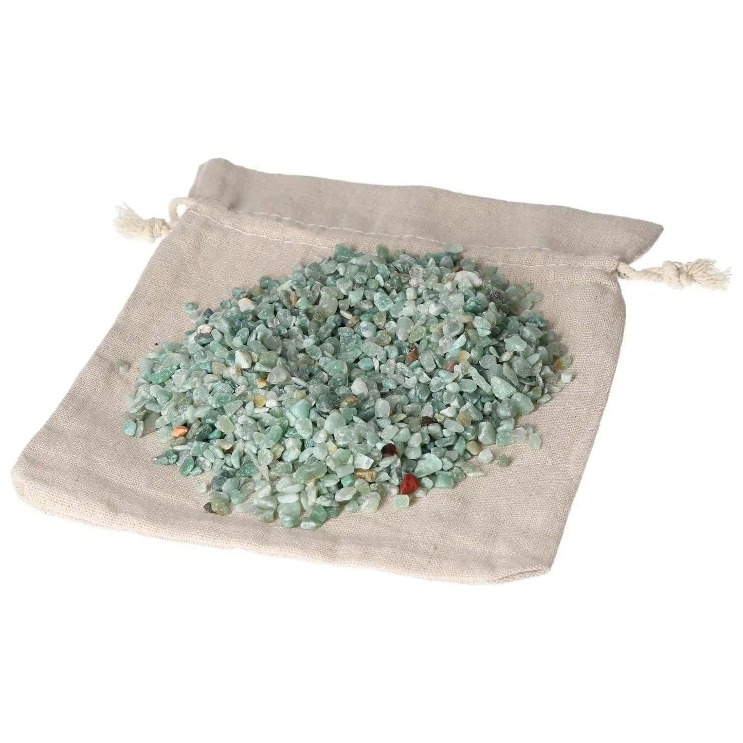 Collection of Quartz Green crystals, 5000 pcs, on a beige pouch, showcasing vibrant green hues and premium quality by Sylvia Crystals.
