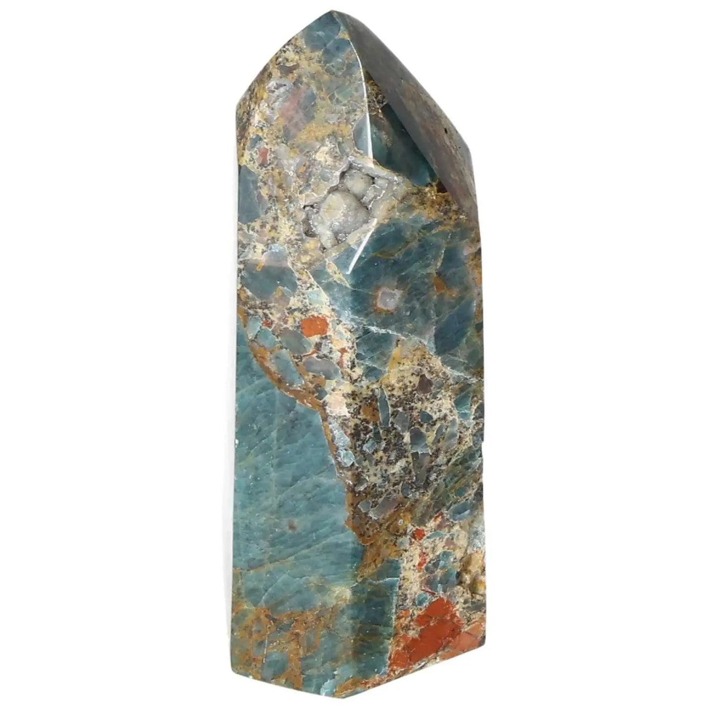Elegant Apatite Obelisk from Sylvia Crystals featuring vibrant blue hues and spiritual qualities.