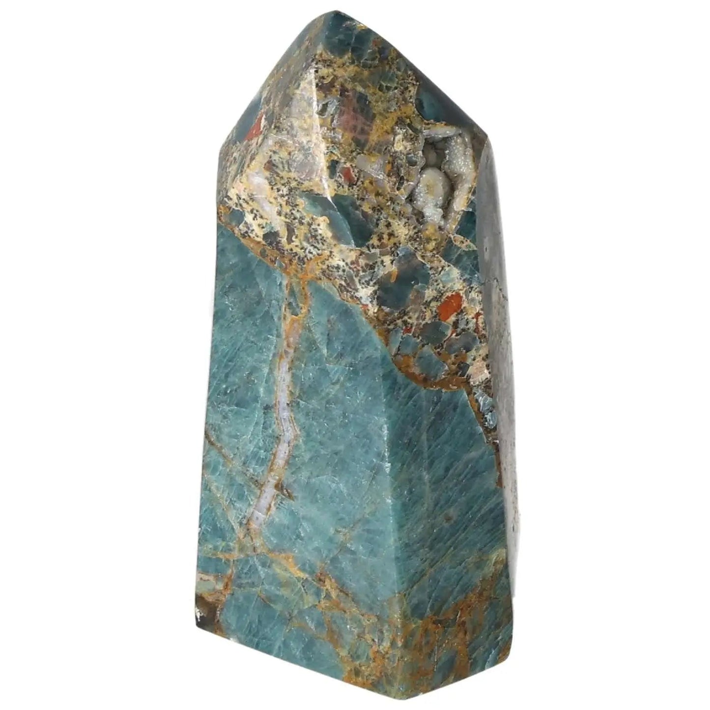 Apatite Obelisk displaying vibrant blue hues, showcasing premium craftsmanship from Sylvia Crystals, renowned for spiritual elegance.