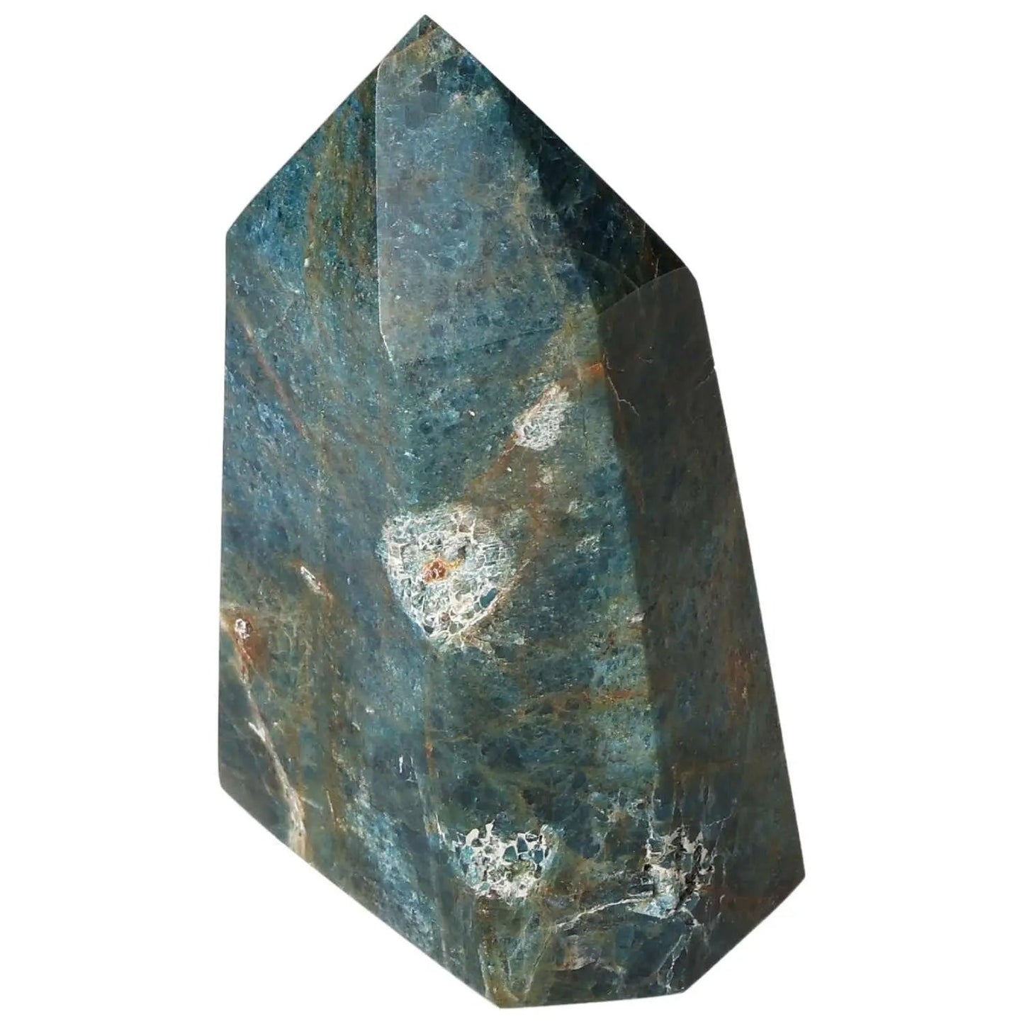 Apatite Obelisk from Sylvia Crystals, a premium decorative piece symbolizing clarity, focus, and vibrant energy in a luxurious setting.