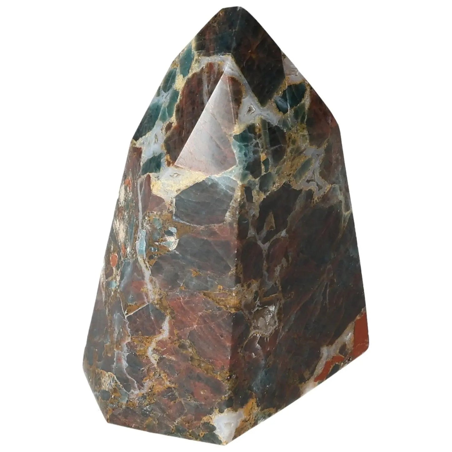 Apatite Obelisk crystal with blue hues, enhancing meditation, by Sylvia Crystals. A decorative piece symbolizing clarity and introspection.