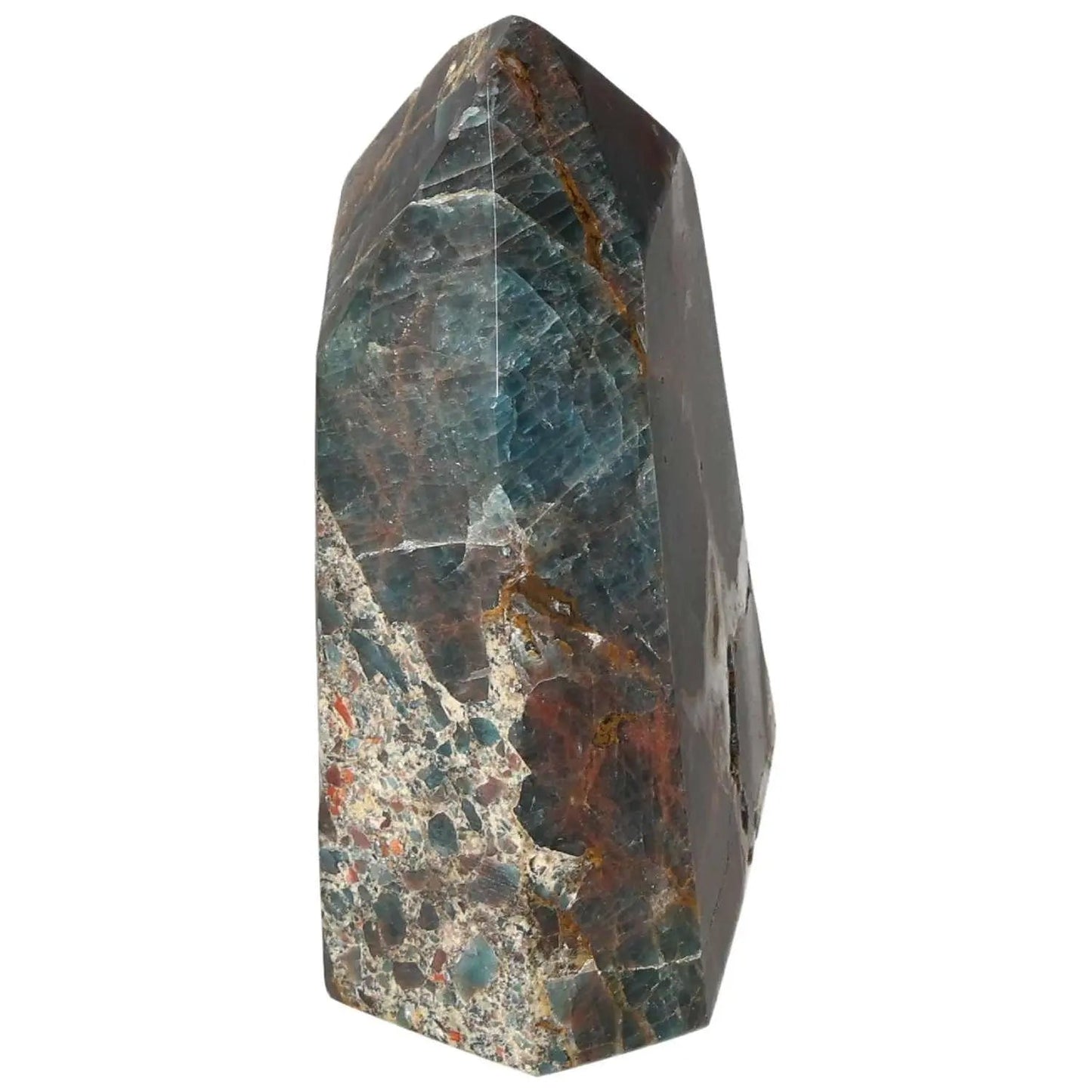 Apatite Obelisk from Sylvia Crystals, showcasing vibrant colors and elegant form, perfect for enriching spiritual and aesthetic spaces.