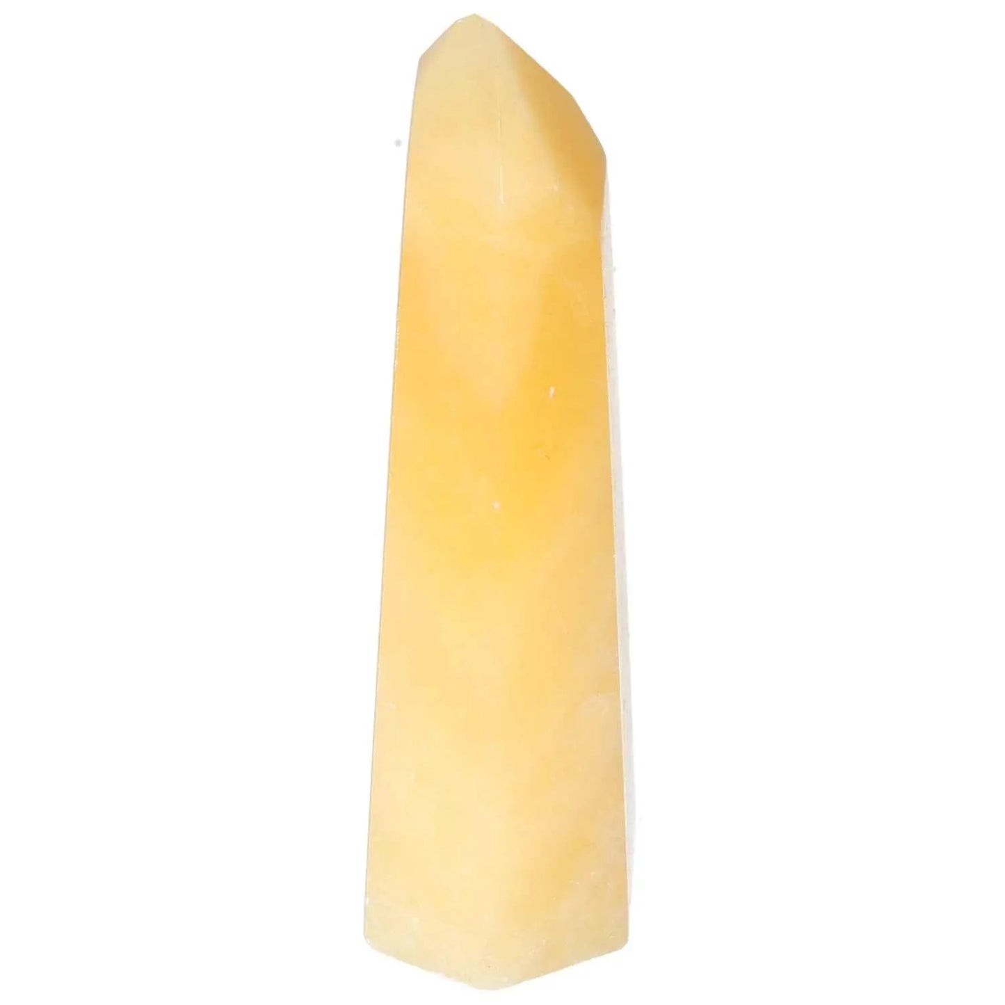 Mexican Calcite Obelisk from Sylvia Crystals, enhancing confidence and energy, a symbol of timeless elegance and conscious living.