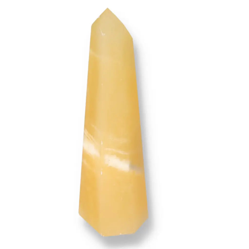 Mexican Calcite Obelisk from Sylvia Crystals. Premium quality, handpicked crystal, enhancing aesthetics and promoting conscious living.