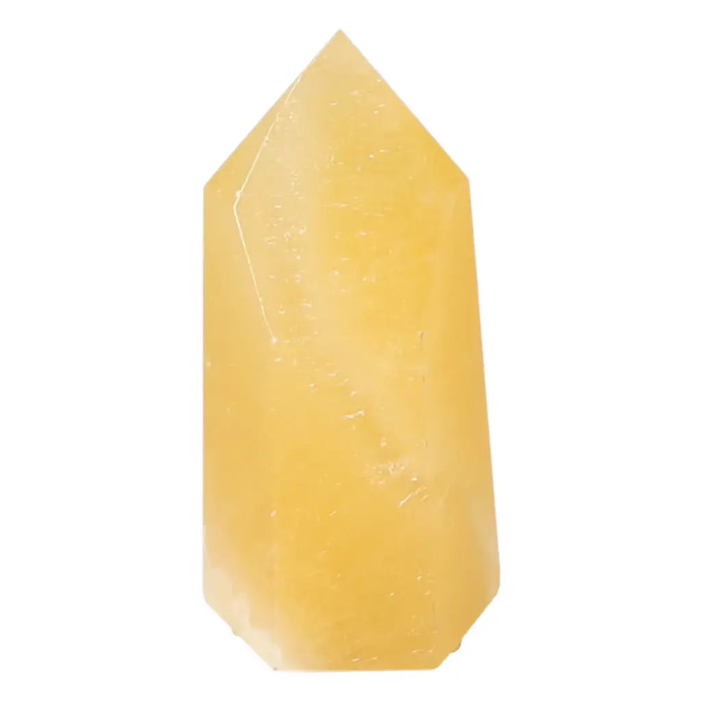 Yellow Mexican Calcite Obelisk for spiritual growth and energy enhancement, handpicked by Sylvia Crystals.