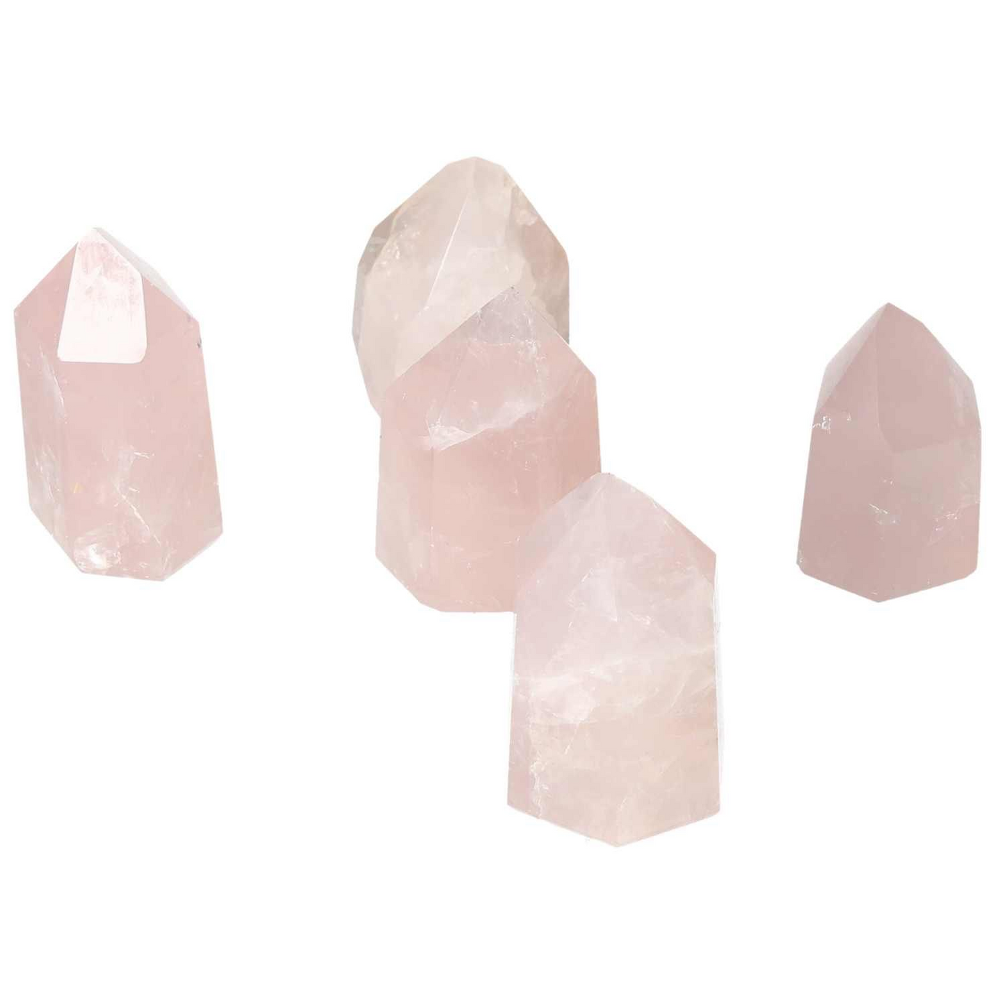Five polished rose quartz obelisks from Sylvia Crystals, known for emotional healing and enhancing love and compassion.