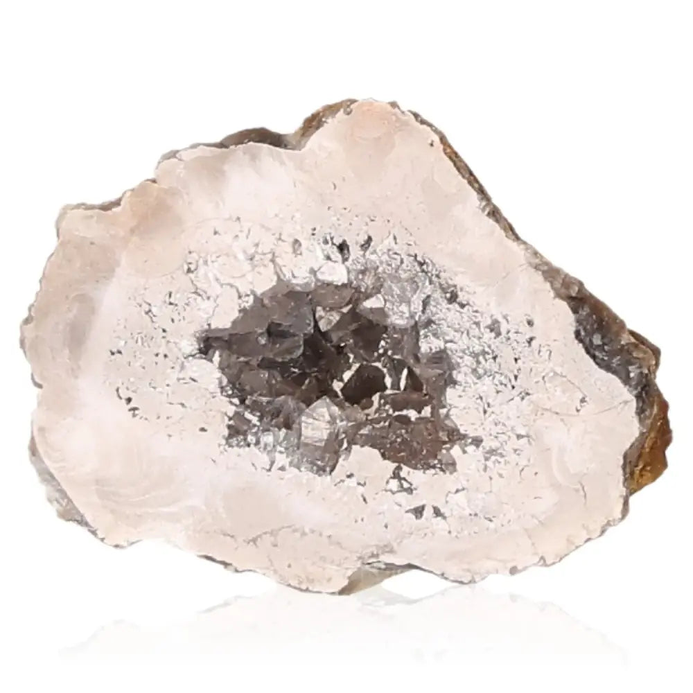 Mini Agate Geode gemstone showcasing natural crystal formations, known for its balancing and grounding energy properties.