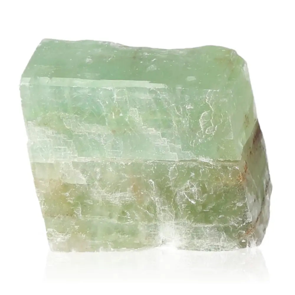 Green Calcite crystal, stone of renewal and emotional healing, vibrant green hues, heart chakra energy for personal growth and peace.