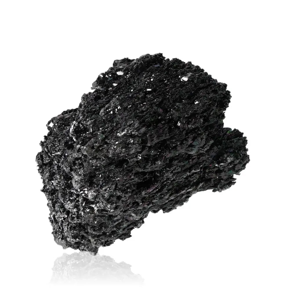 Carborundite or Silicon Carbide mineral, black shimmering surface, known for protection, mental clarity, and spiritual strength.
