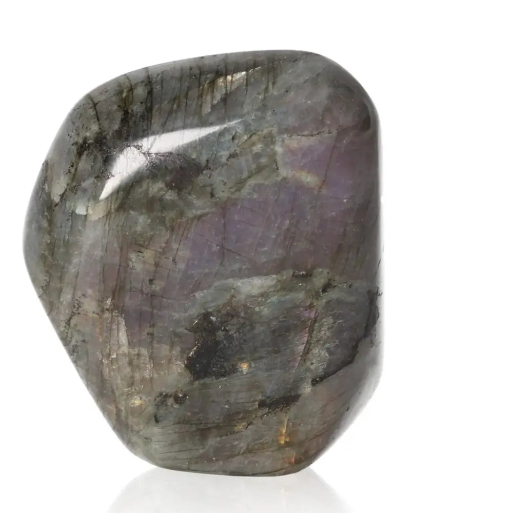 Polished Cut Base Labradorite by Sylvia Crystals with vibrant flashes and sleek design, showcasing natural beauty and energy.