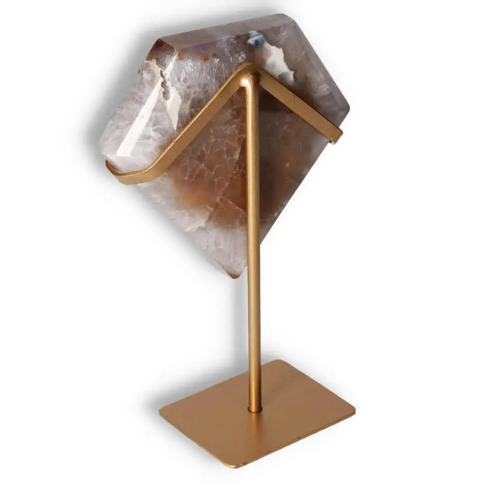 Agate decoration with stand featuring polished natural patterns and crystalline formations for elegant home accents.
