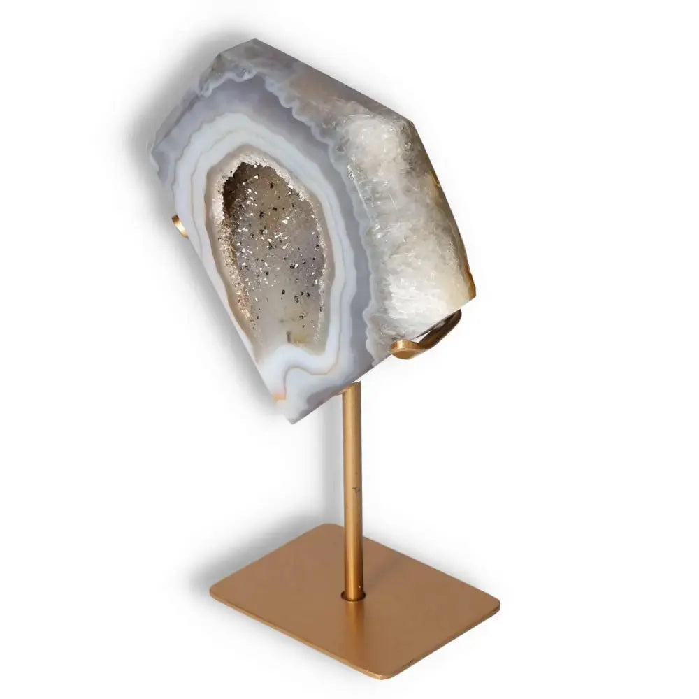 Elegant agate decoration on a stand, featuring natural patterns and crystalline formations, ideal for sophisticated home decor.