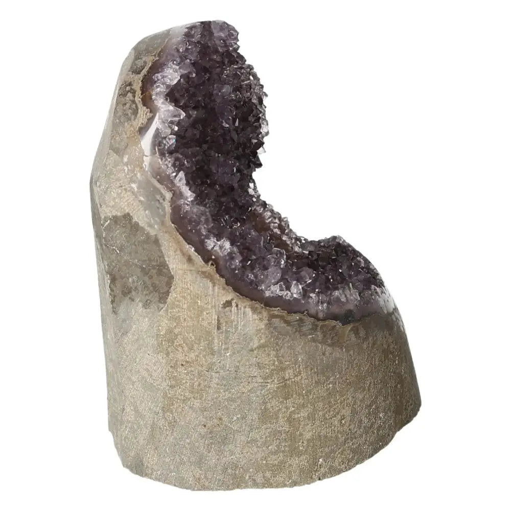Amethyst cut base geode from Sylvia Crystals, showcasing natural purple hues and raw beauty, perfect for stress relief and energy renewal.