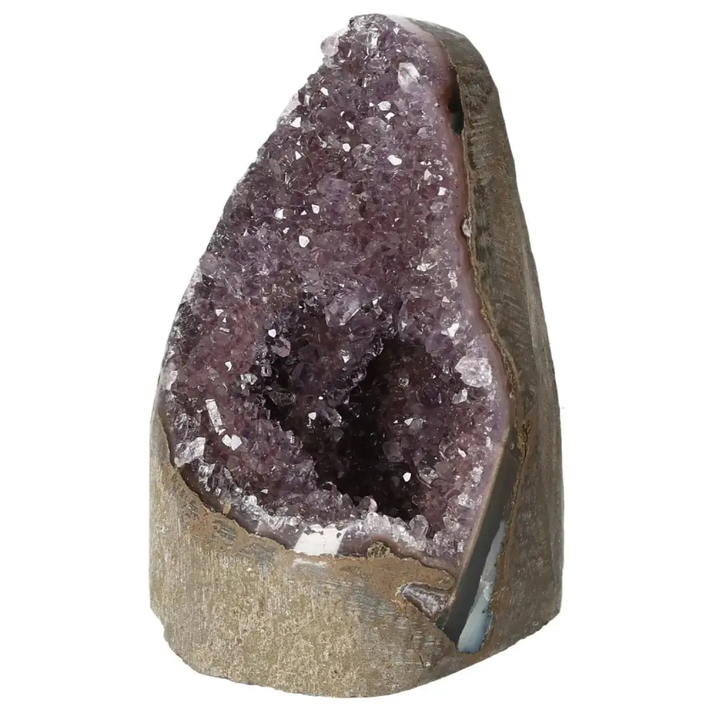 Amethyst Cut Base Geode from Sylvia Crystals, showcasing sparkling purple crystals and natural stone base, ideal for stress relief.