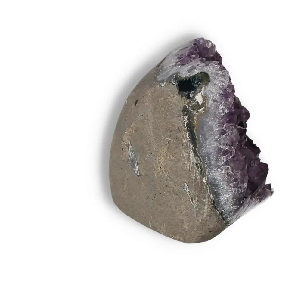 Elegant Amethyst Cut Base Geode from Sylvia Crystals, showcasing its natural beauty and tranquil energy.