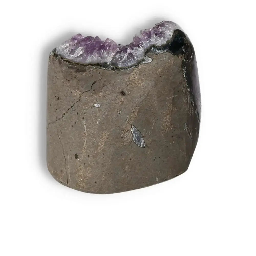 Amethyst Cut Base Geode from Sylvia Crystals, showcasing purple crystal formation on a stone base, enhancing tranquility and energy.