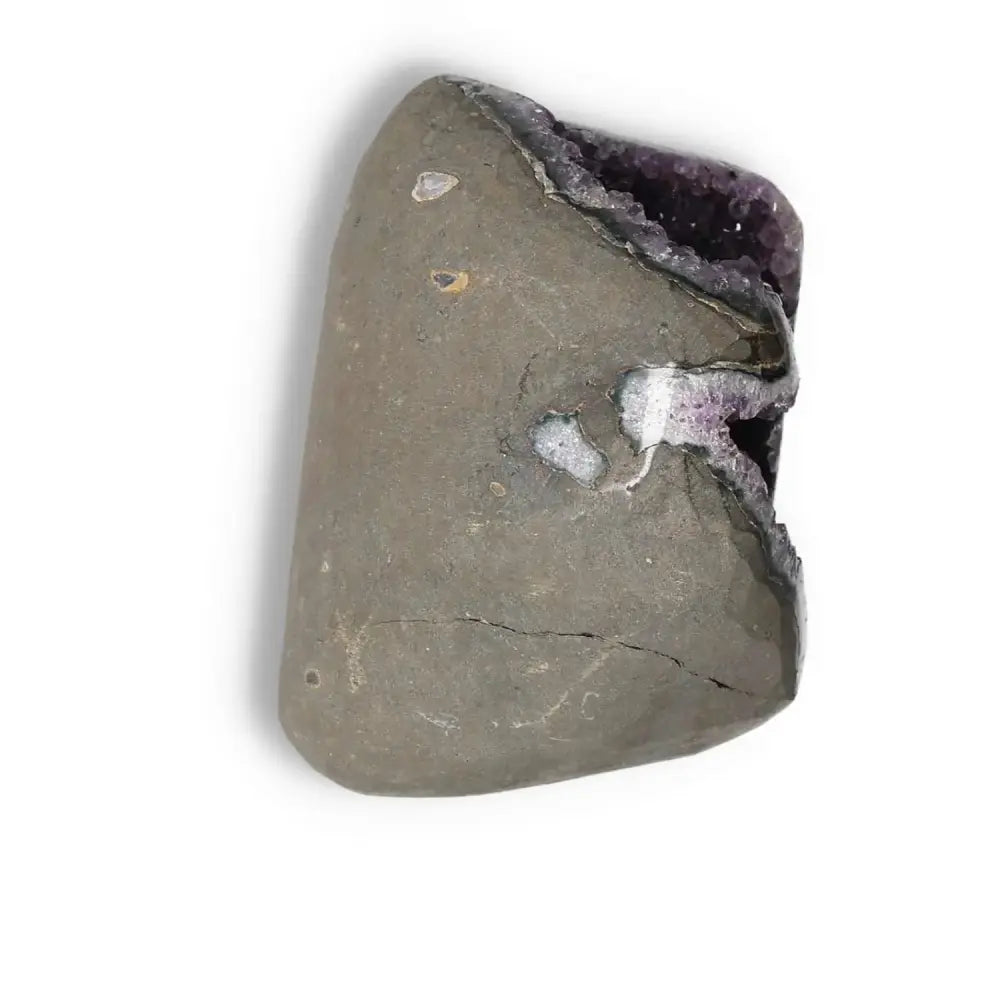 Amethyst Cut Base Geode from Sylvia Crystals, handpicked for stress reduction and energy boost, featuring vibrant purple crystals.