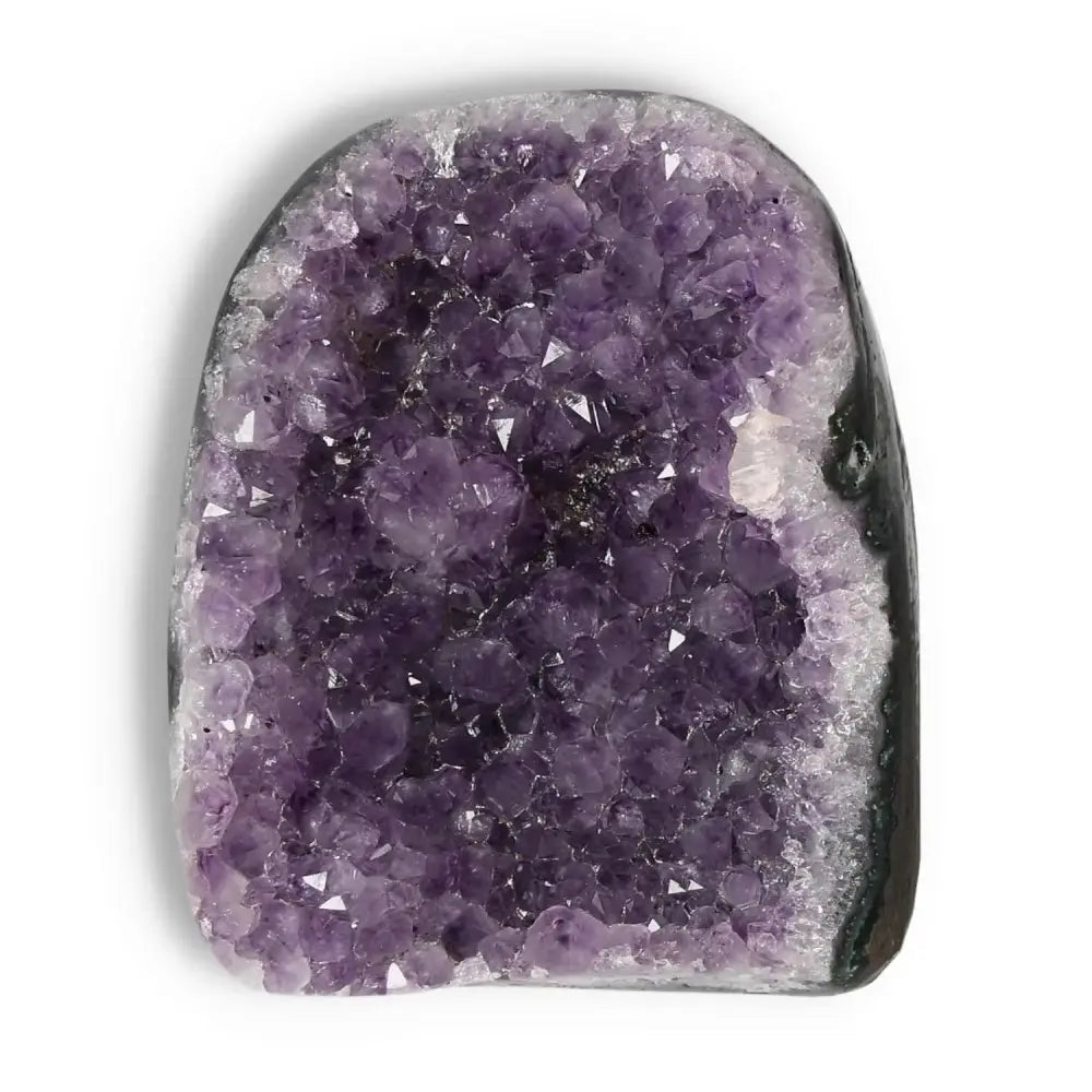 Amethyst Cut Base Geode by Sylvia Crystals showcasing deep violet hues, ideal for enhancing aesthetics and spiritual well-being.
