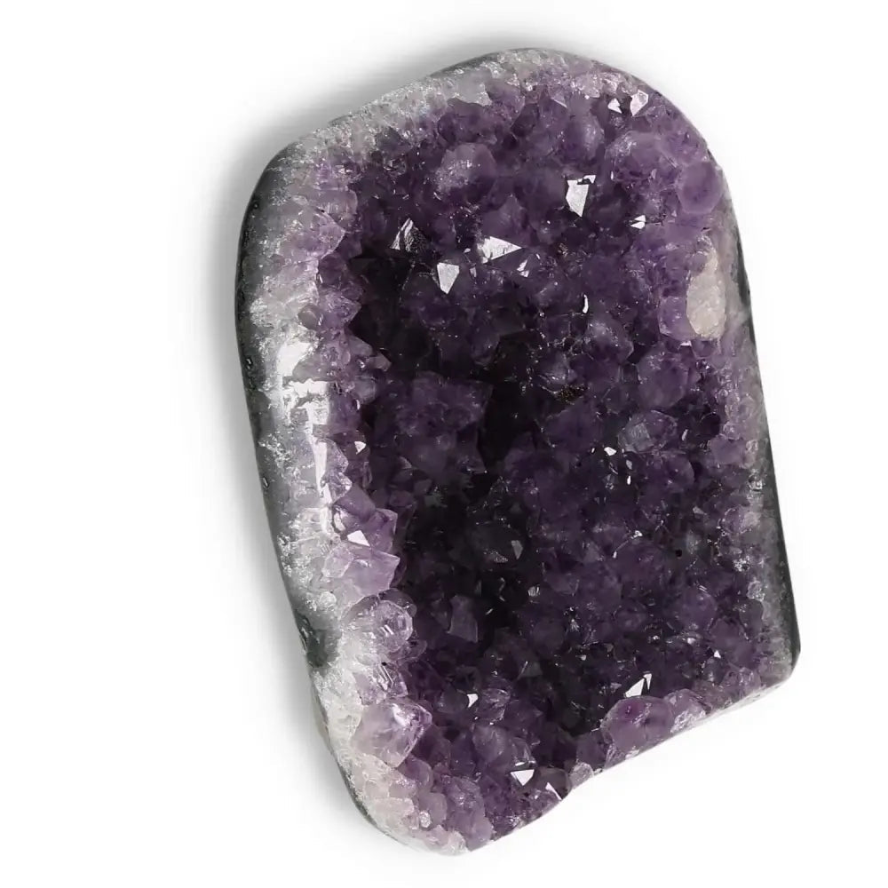 Amethyst Cut Base Geode by Sylvia Crystals, featuring stunning violet hues for luxury and enhanced concentration.