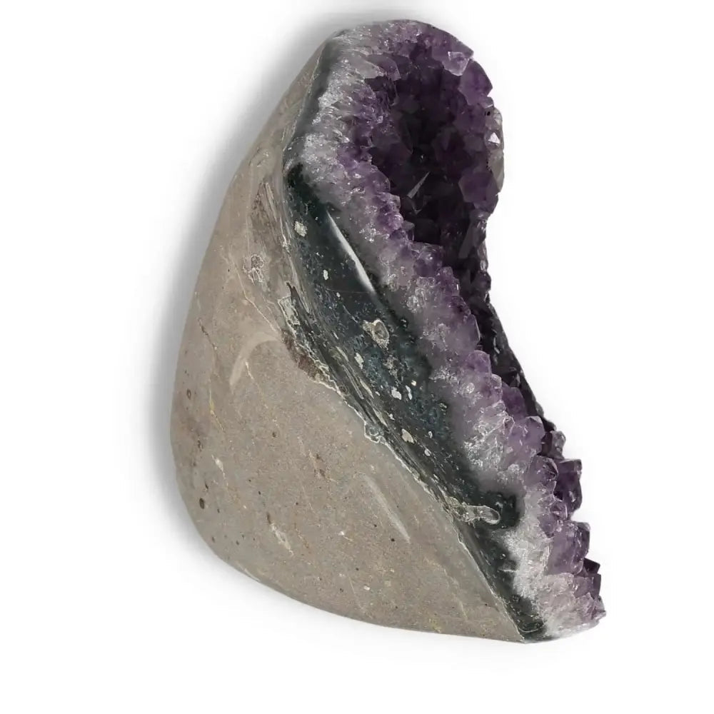 Amethyst Cut Base Geode by Sylvia Crystals, featuring a stunning violet hue, enhancing concentration and spiritual well-being.