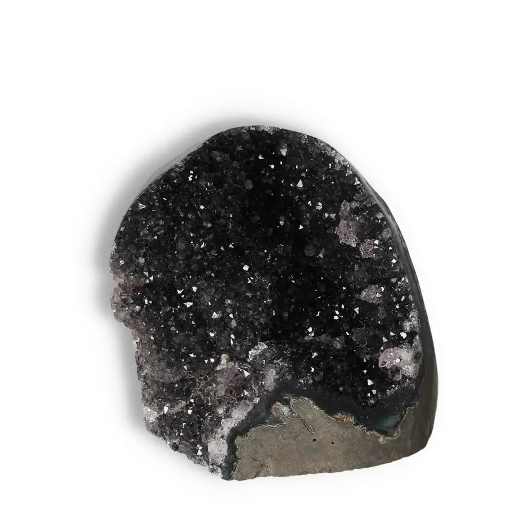 Amethyst Cut Base Geode from Sylvia Crystals, offering stress reduction and tranquility for luxury conscious living spaces.