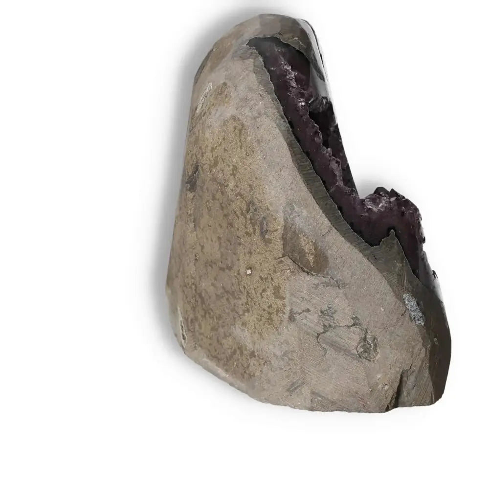 Amethyst Cut Base Geode by Sylvia Crystals featuring deep purple hues, embodying natural elegance and conscious living.