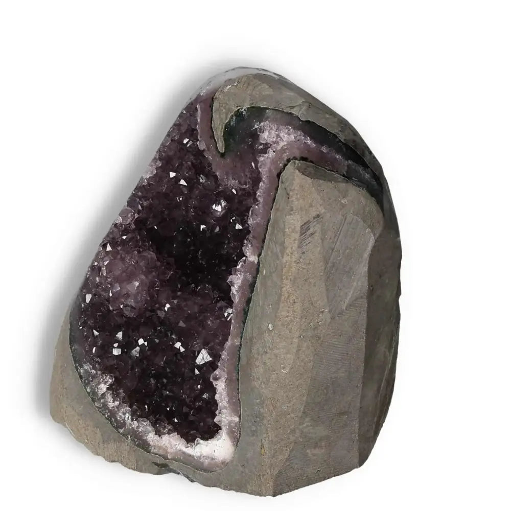 Amethyst Cut Base Geode by Sylvia Crystals, showcasing deep purple hues, for natural elegance and conscious living.