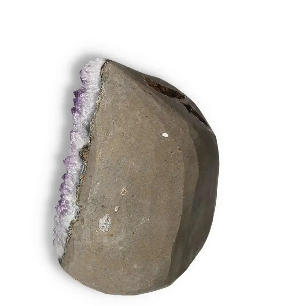 Amethyst Cut Base Geode from Sylvia Crystals, showcasing luxury and stress-relief properties. Handpicked for elegance and spiritual depth.