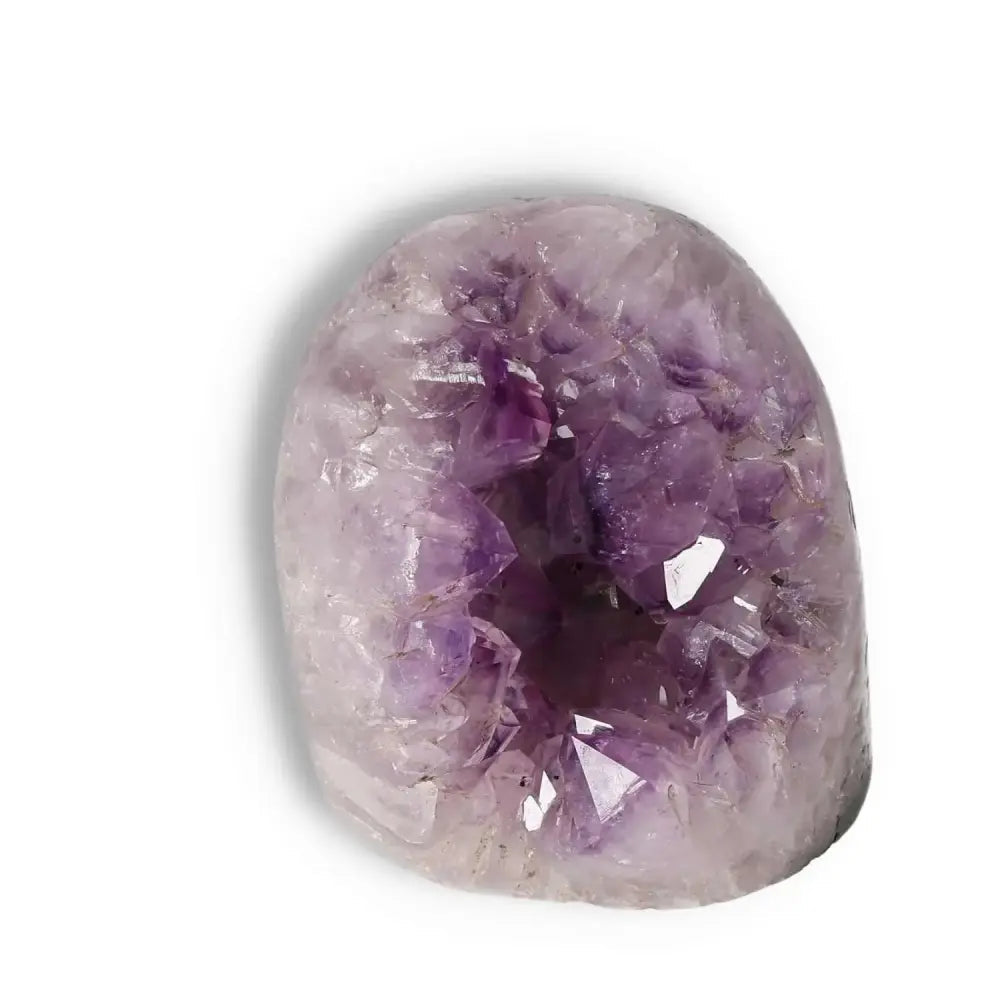 Stunning Amethyst Cut Base Geode from Sylvia Crystals, showcasing vibrant purple hues perfect for stress reduction and concentration.