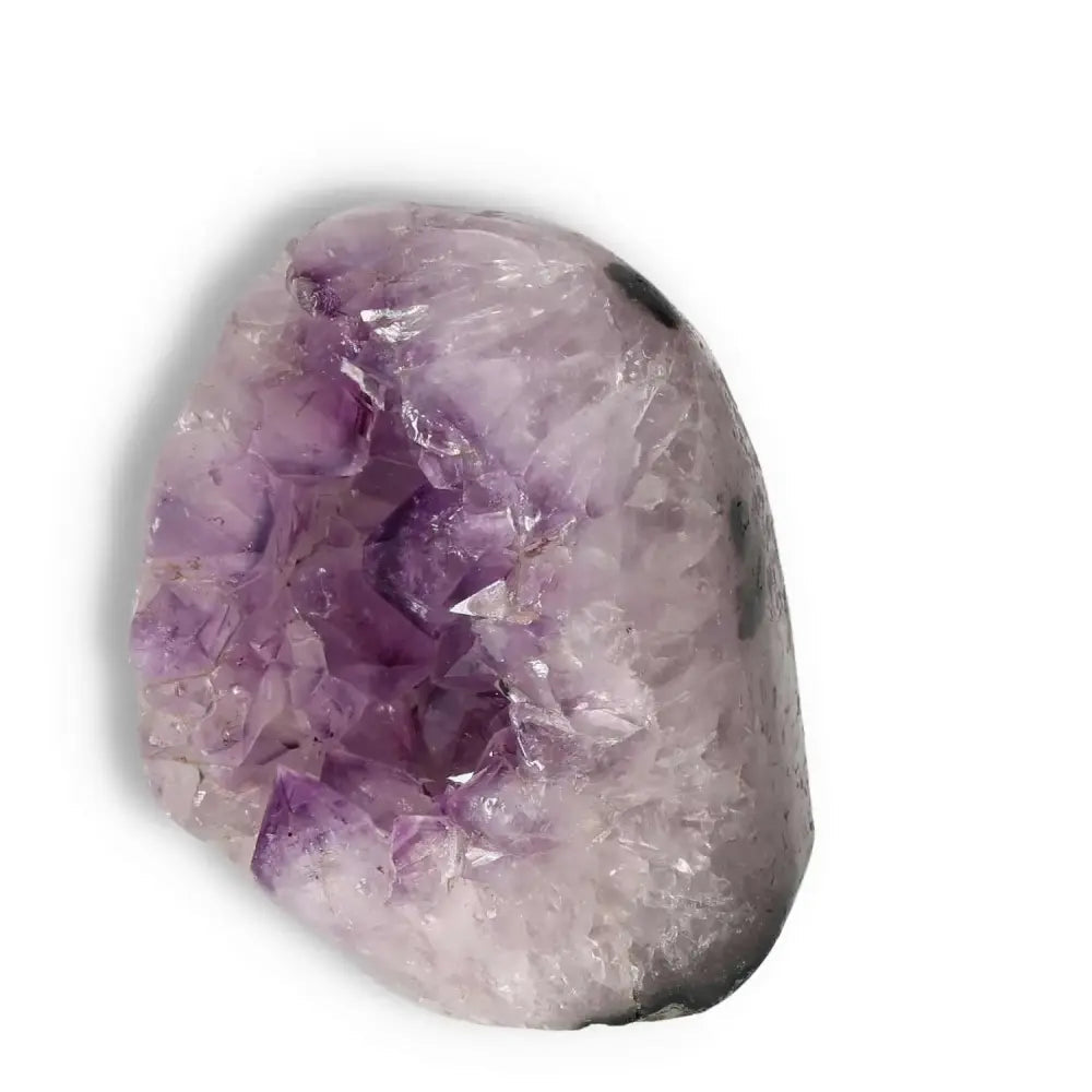 Amethyst Cut Base Geode from Sylvia Crystals, showcasing vibrant purple hues and natural artistry, enhances energy and concentration.