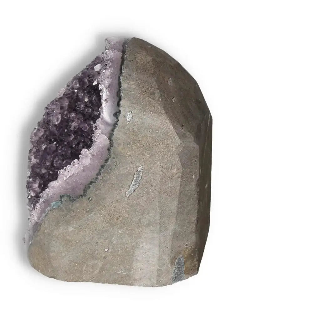 Amethyst Cut Base Geode by Sylvia Crystals, luxury decor piece enhancing elegance and spirituality in living spaces.