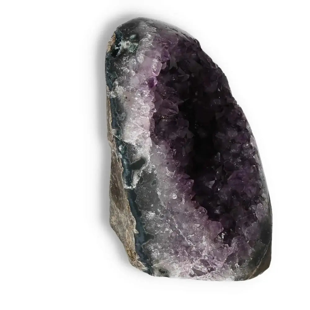 Stunning Amethyst Cut Base Geode by Sylvia Crystals, showcasing deep purple hues and natural allure for luxury and spirituality.