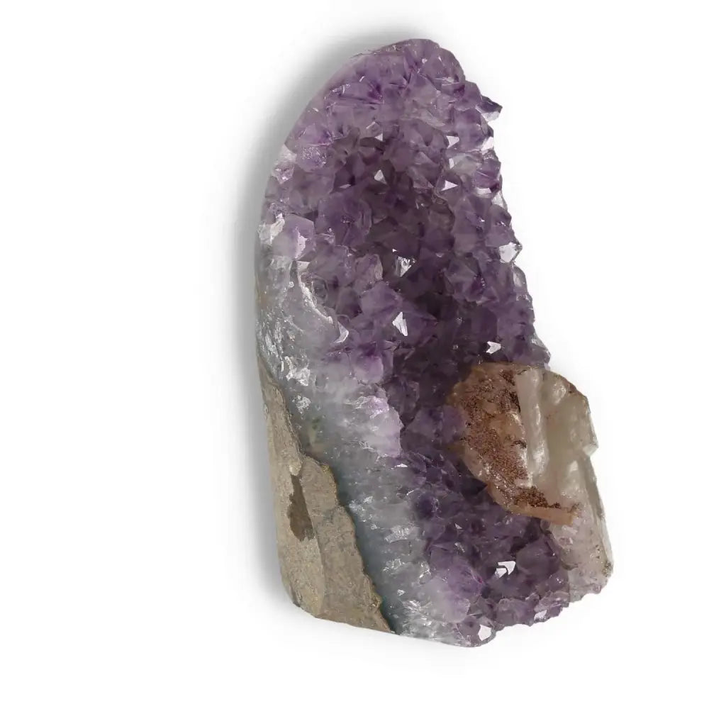 Premium Amethyst Cut Base Geode by Sylvia Crystals, showcasing elegant, stress-reducing purple crystals on a natural stone base.