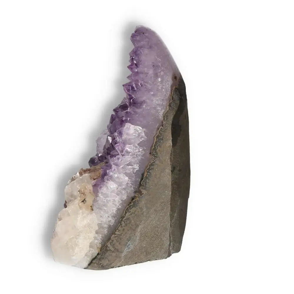 Amethyst Cut Base Geode from Sylvia Crystals, showcasing shimmering purple hues and natural elegance for tranquility and stress relief.