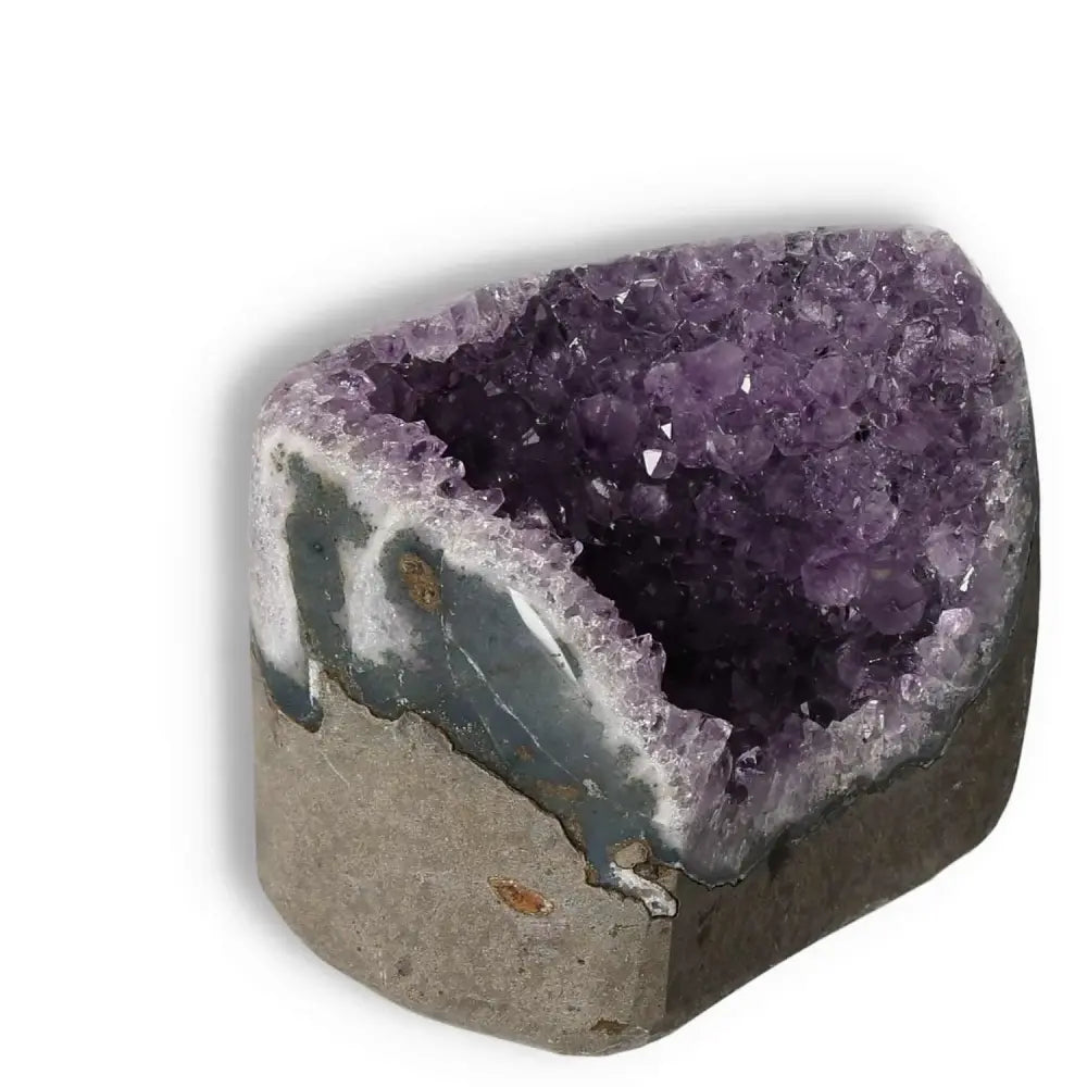 Amethyst Cut Base Geode with deep purple crystals from Sylvia Crystals, symbolizing peace and spirituality, high-quality and unique.