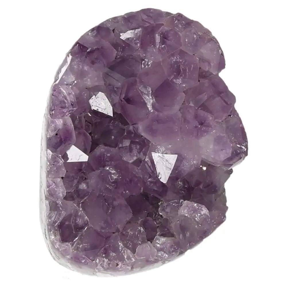 Amethyst Cut Base Geode by Sylvia Crystals showcasing deep purple hues and crystalline structure, exemplifying luxury and natural beauty.