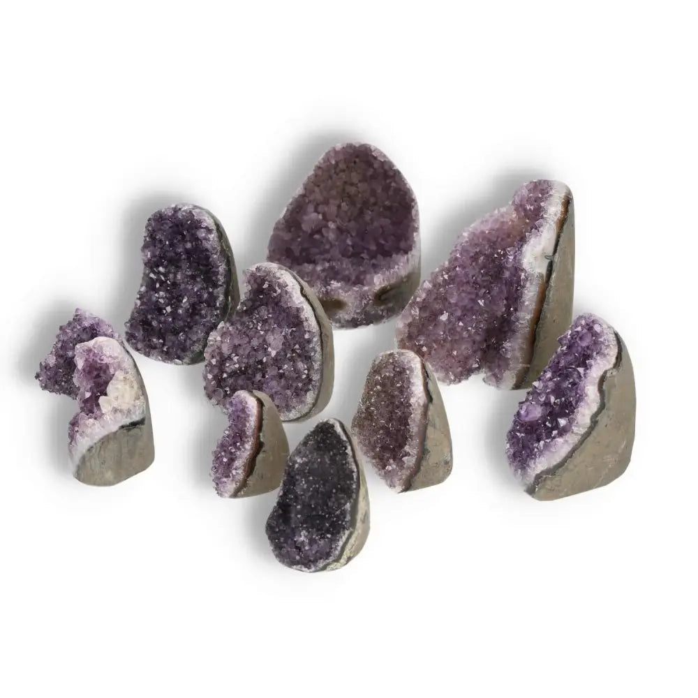 Amethyst cut base geodes 0.1-1 kg from Sylvia Crystals showcasing luxury and spiritual wellness benefits.
