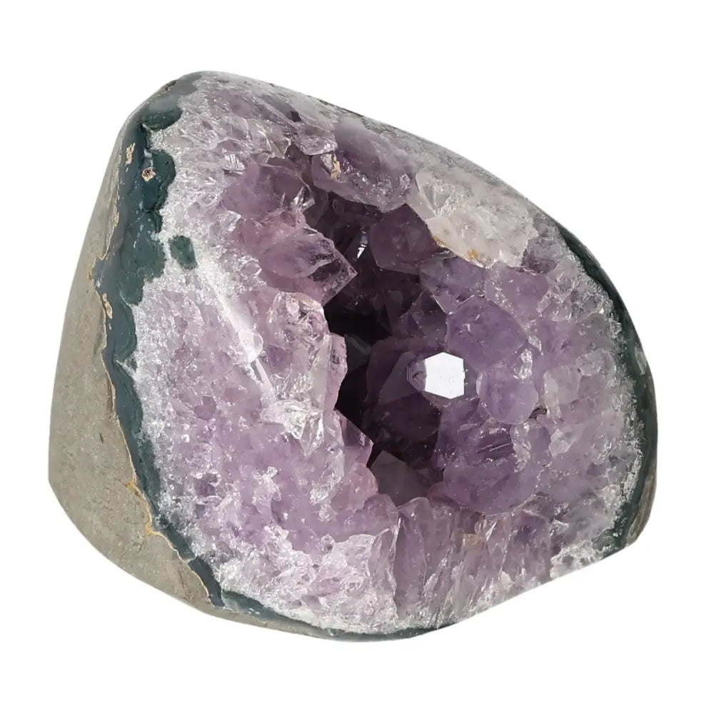 Amethyst cut base geode showcasing deep purple crystals from Sylvia Crystals, embodying luxury and spirituality.