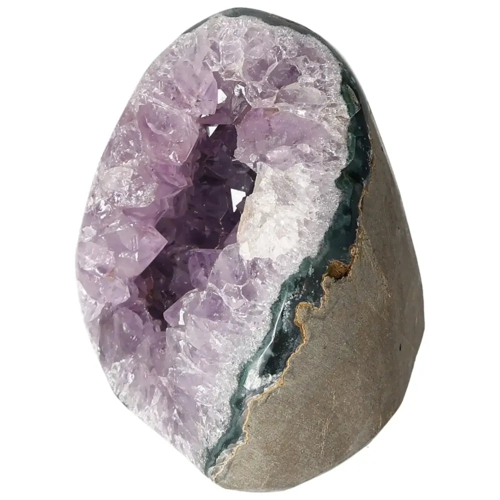 Amethyst cut base geode showcasing deep purple crystals from Sylvia Crystals, epitomizing luxury and spiritual harmony.