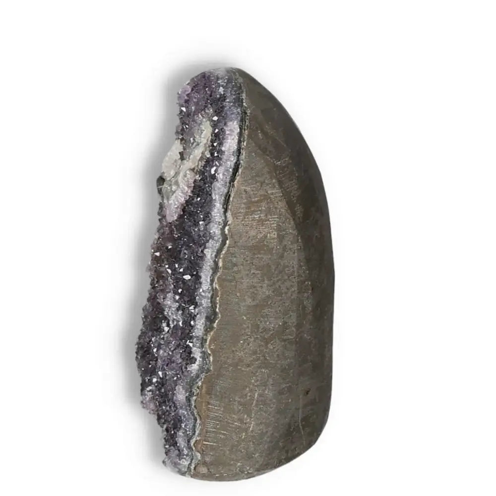 Elegant Amethyst cut base geode from Sylvia Crystals, known for its stress-relieving properties and high-quality handpicked design.