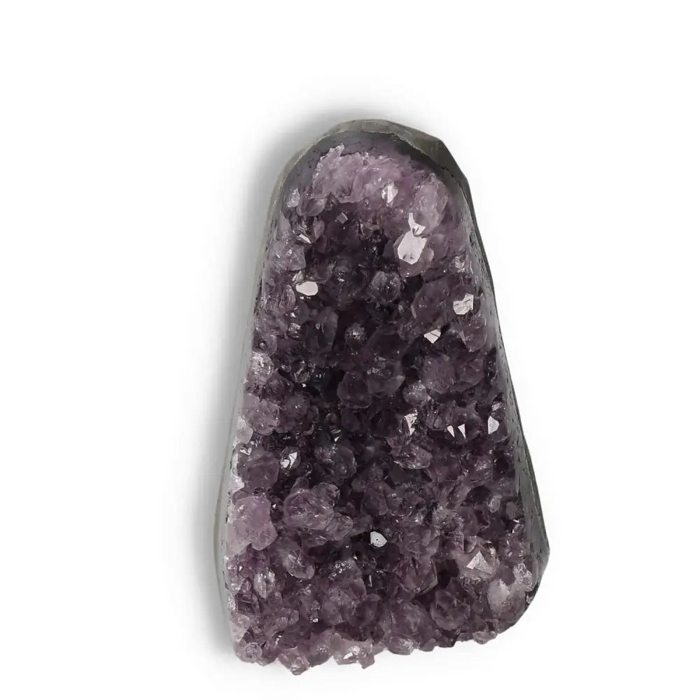 Amethyst cut base geode with deep purple crystals, known for stress reduction and emotional balance, premium quality from Sylvia Crystals.