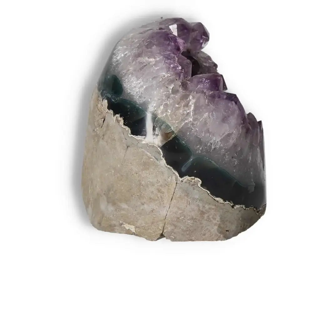 Amethyst cut base geode by Sylvia Crystals, showcasing premium craftsmanship and enhancing stress relief and energy.