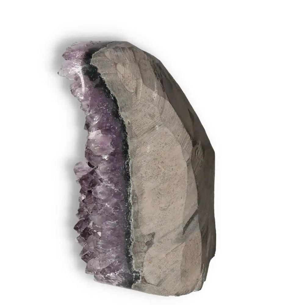 Amethyst cut base geode with high clarity, showcasing stunning purple crystals, from Sylvia Crystals' premium collection.