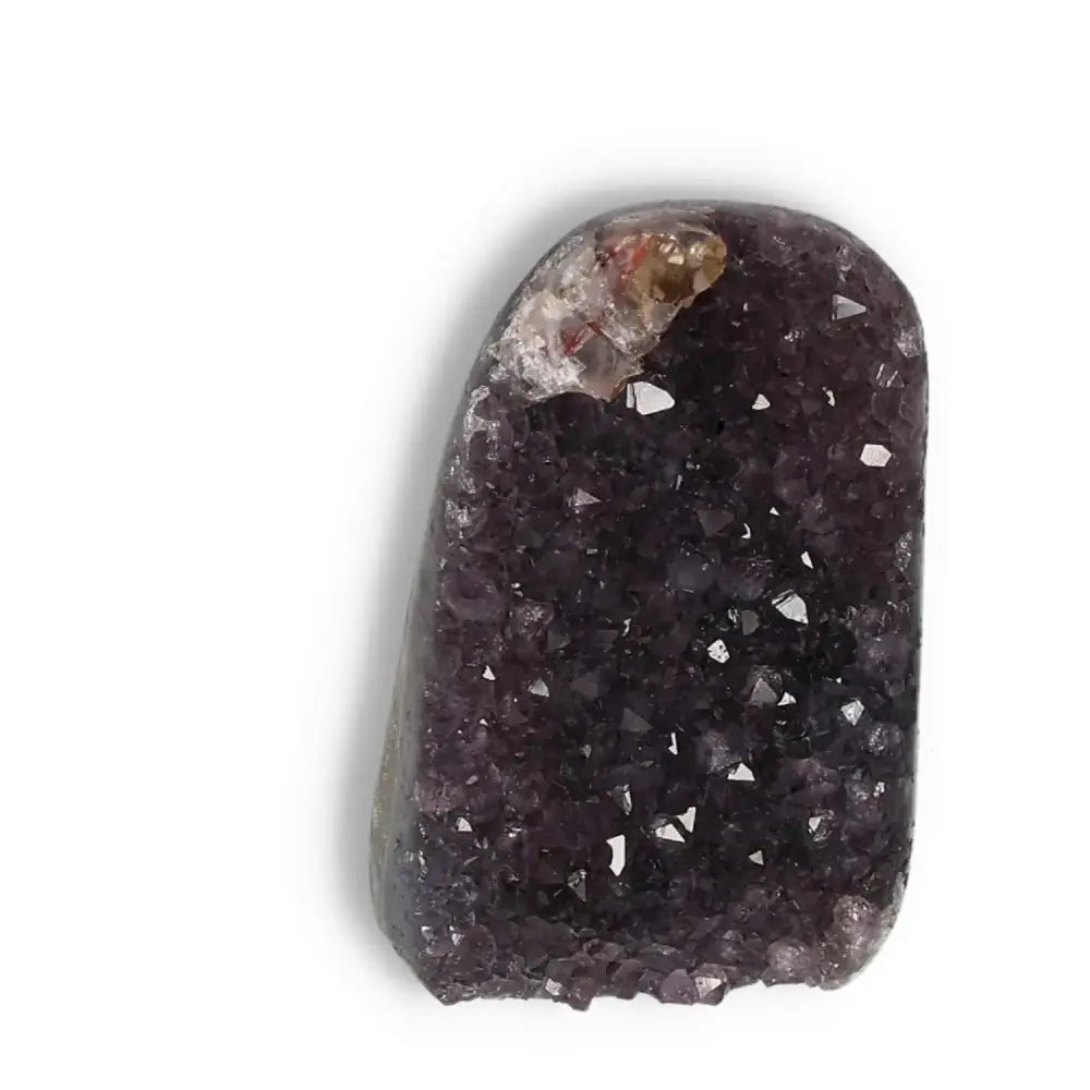 Amethyst cut base geode from Sylvia Crystals, showcasing its deep purple hues and crystalline structure, enhancing spiritual well-being.