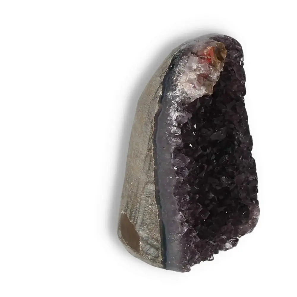"Amethyst cut base geode with intricate purple crystals, a premium selection from Sylvia Crystals, enhancing spiritual well-being."