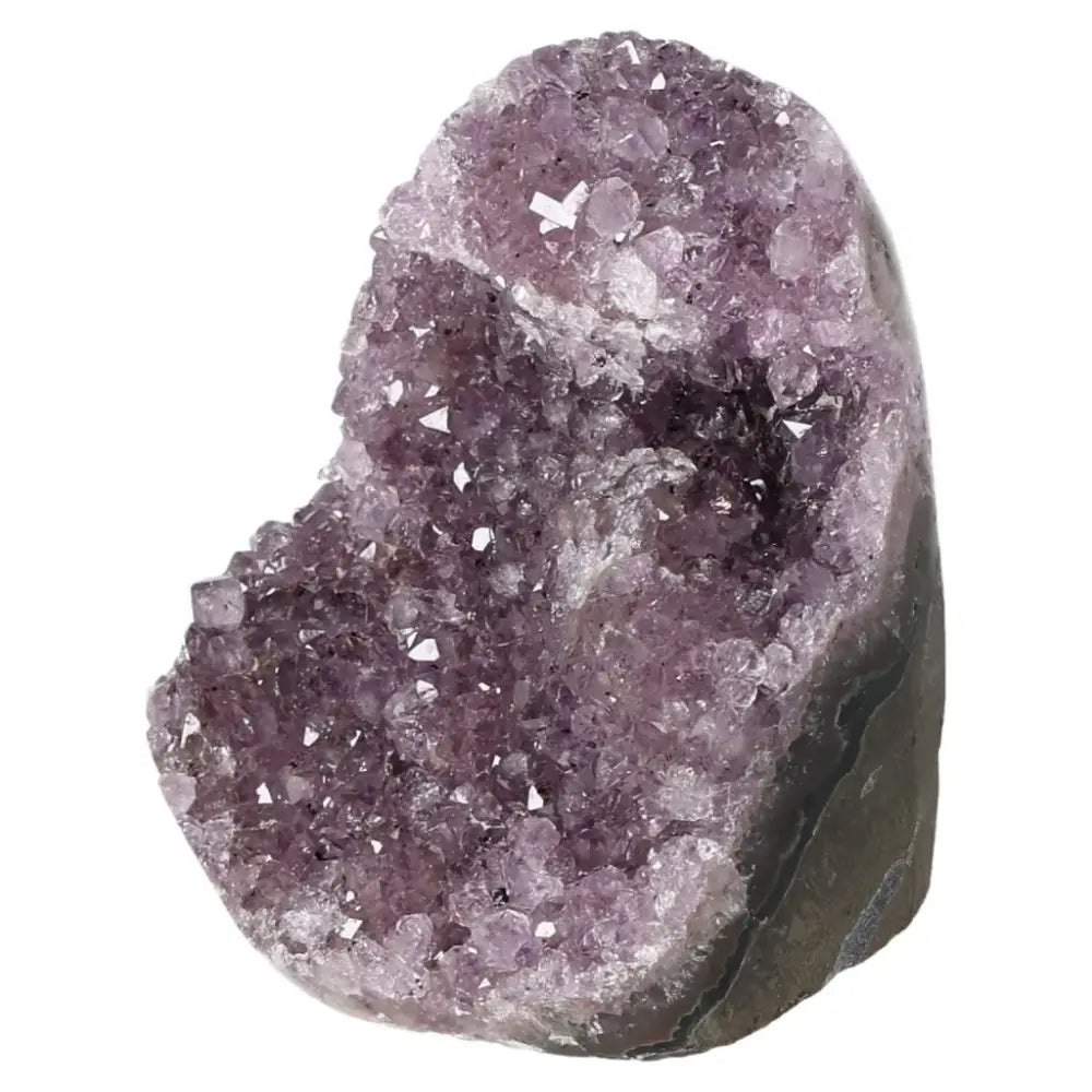 Amethyst cut base geode from Sylvia Crystals, featuring deep purple hues and sparkling crystals, enhancing well-being and reducing stress.