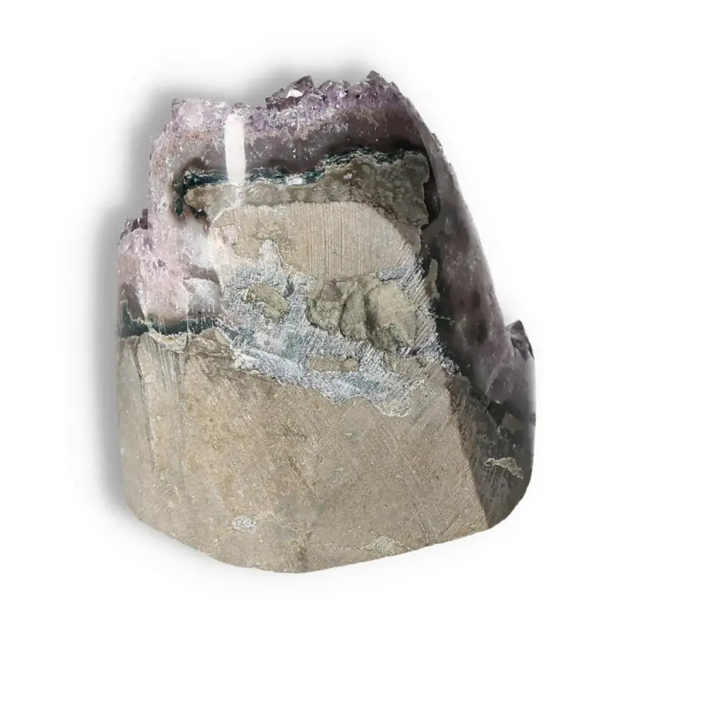 Amethyst cut base geode from Sylvia Crystals, showcasing deep purple hues and natural elegance for stress relief and emotional stability.