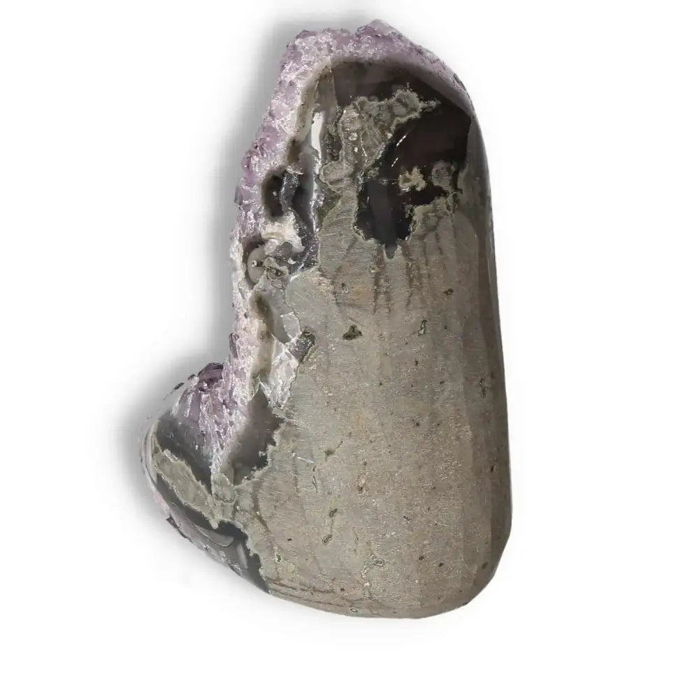 Amethyst cut base geode, a premium piece by Sylvia Crystals, known for its calming properties and energy-boosting effects