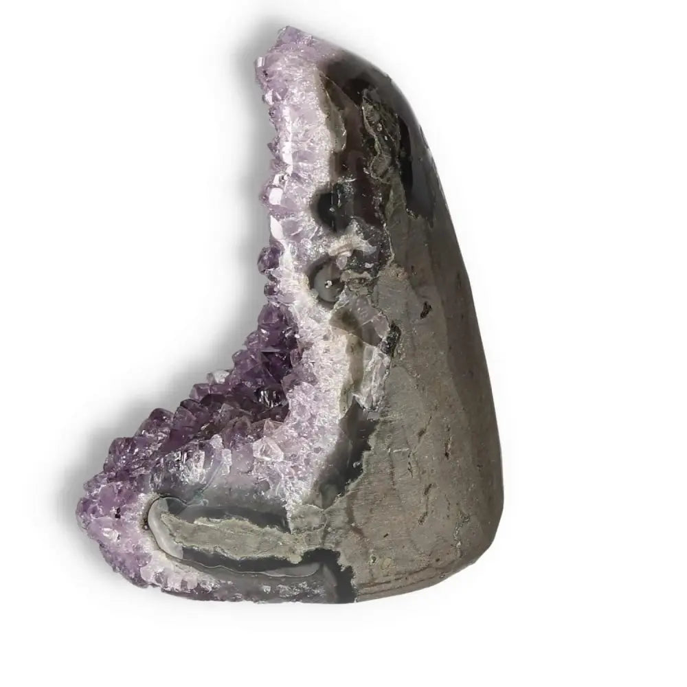 Amethyst cut base geode by Sylvia Crystals, enhances energy, reduces stress, promotes emotional stability.