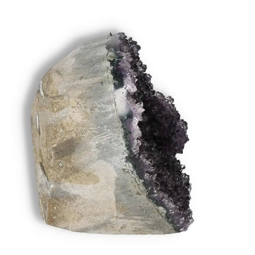 Amethyst cut base geode from Sylvia Crystals, showcasing luxury and spiritual elegance. Ideal for enhancing living or spiritual space.